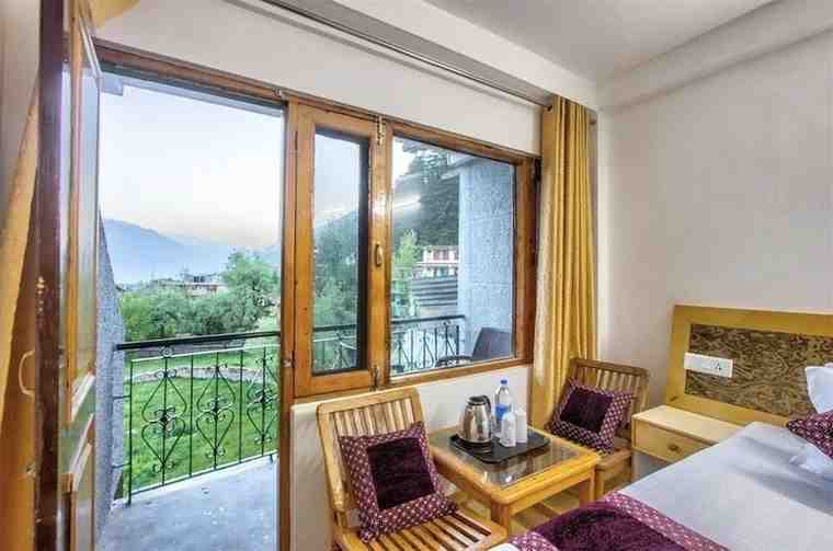 RoomandbalconyviewofHotelSolitaireManali